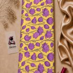 Playful floral print with purple blossoms on a warm golden yellow background- Italian Silk (ST01)