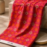 geometric floral pattern in vibrant orange, fuchsia pink, ivory, and soft red tones-Italian Chiffon (CF01)