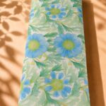 Soft blue floral pattern with fresh green foliage in a delicate botanical design-Spanish Cotton (PC11)