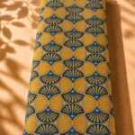 Geometric fan pattern in mustard gold and navy blue with a bold Art Deco-inspired design-Spanish Cotton (PC11)