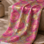 Light gray chiffon zari fabric featuring vibrant pink floral blooms with shimmering gold accents for a graceful, luxurious look-Italian Chiffon Zari (ZR16)
