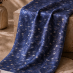 Navy blue chiffon zari fabric featuring flowing abstract brushstroke patterns with shimmering gold accents for a sophisticated, modern look-Italian Chiffon Zari (ZR16)