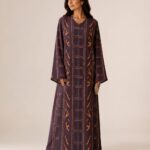 Deep plum abaya featuring elegant vertical patterns in warm orange and pink tones for a refined modern look