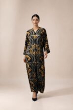 Black abaya featuring luxurious gold baroque-inspired motifs with intricate symmetrical detailing for an elegant statement look