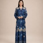 Navy blue abaya featuring elegant beige and blue floral motifs for a graceful, sophisticated look