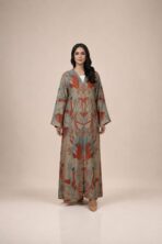 Beige abaya featuring artistic botanical motifs in warm terracotta and soft blue tones, arranged in a beautiful symmetrical pattern