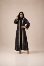 Open-front abaya featuring refined plaid detailing in deep navy and beige tones, finished with elegant contrasting borders