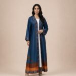 Rich blue open abaya featuring geometric borders in warm rust tones, complemented by a striking palm-inspired motif on the back