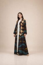 Open-front abaya featuring bold geometric and abstract motifs in teal, beige, mustard, and deep brown tones