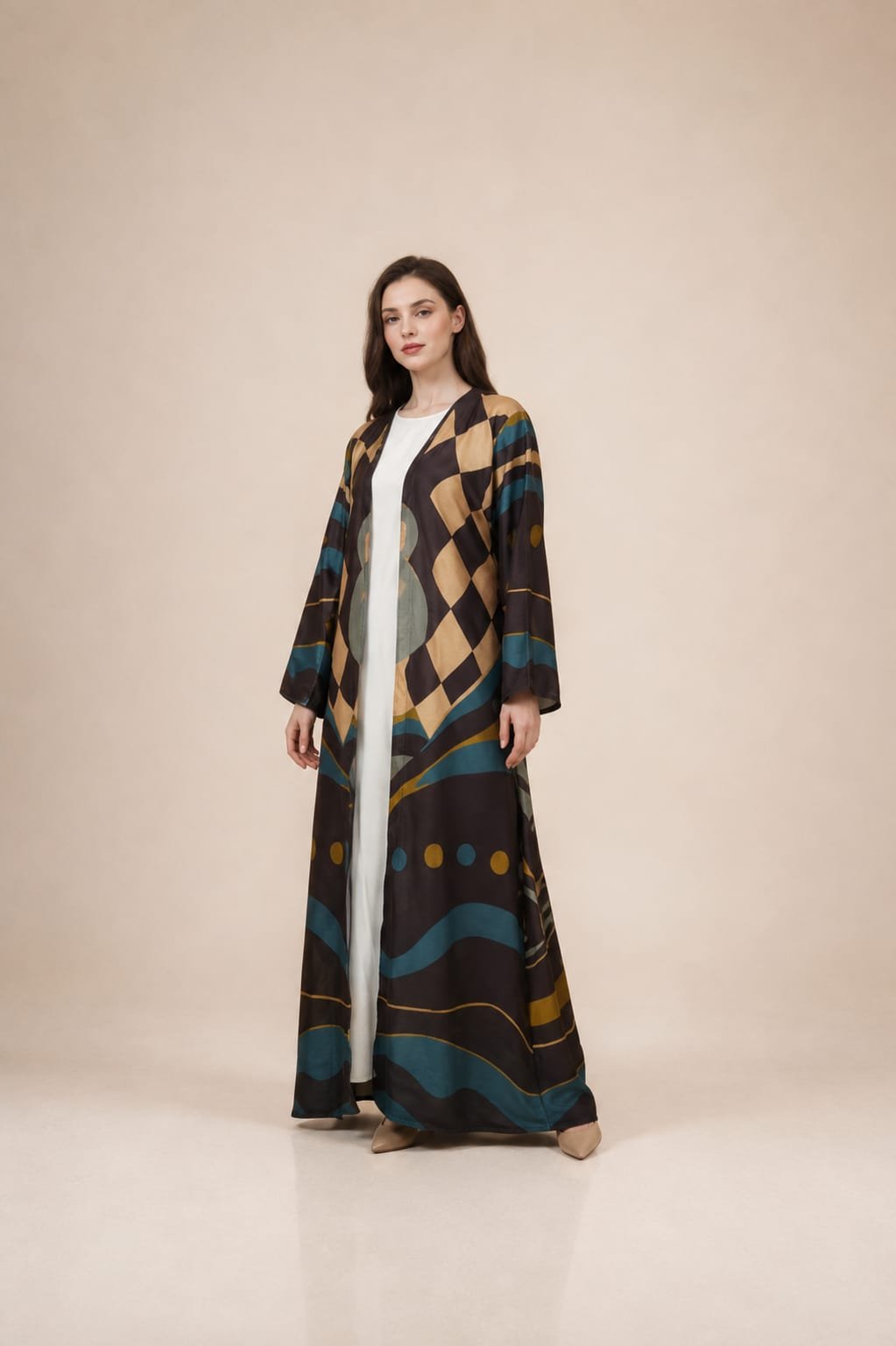 2026/08/1000054577-1.jpg Open-front abaya featuring bold geometric and abstract motifs in teal, beige, mustard, and deep brown tones - Image 1