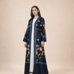 Navy blue abaya adorned with delicate multicolored floral motifs and refined blue border detailing