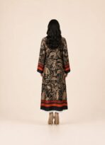Warm beige abaya adorned with intricate black botanical motifs and vibrant orange border accents - Image 2