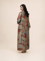 Beige abaya featuring artistic botanical motifs in warm terracotta and soft blue tones, arranged in a beautiful symmetrical pattern - Image 2
