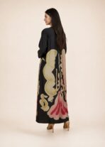 Statement abaya featuring a bold symmetrical floral-inspired print in soft beige, blush pink, red, and olive tones. - Image 2