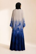 Elegant beige abaya featuring a deep blue gradient print, creating a sophisticated and modern look - Image 2