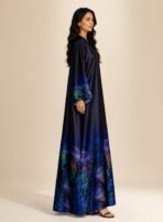 Elegant navy abaya featuring vibrant jellyfish-inspired prints along the hem and sleeves, with a smooth flowing silhouette - Image 3