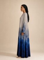 Elegant beige abaya featuring a deep blue gradient print, creating a sophisticated and modern look - Image 3