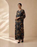 Black abaya featuring luxurious gold baroque-inspired motifs with intricate symmetrical detailing for an elegant statement look - Image 3