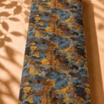 Artistic floral pattern in rich blue, mustard, and warm brown tones (CR01)
