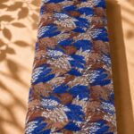 Bold blue and brown leaves with elegant ivory botanical details (CR01)