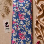 Elegant floral design featuring vibrant pink and soft ivory flowers with delicate golden-green leaves on a rich royal blue background - Silk Jacquard (JD02)