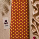 Retro-inspired yellow polka dot pattern on a warm rust-red background - Silk Jacquard (JD02)