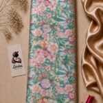 Romantic botanical design featuring soft pink and peach flowers with delicate butterflies and leafy details on a fresh turquoise background - Silk Jacquard (JD02)