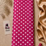 Playful white polka dot pattern on a vibrant fuchsia pink background - Silk Jacquard (JD02)