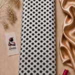 Timeless black polka dot pattern on a clean ivory-white background - Silk Jacquard (JD02)
