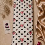 Charming polka dot design with delicate red rose bouquets and black dots on a soft ivory background - Silk Jacquard (JD02)