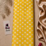 Classic white polka dot pattern on a vibrant yellow Boutila fabric - Silk Jacquard (JD02)