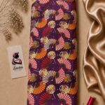 Japanese-inspired fan pattern in red, white, and golden yellow on a rich deep purple background - Silk Jacquard (JD02)