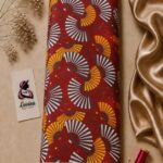 Japanese-inspired fan pattern in white, yellow, and orange on a deep red background - Silk Jacquard (JD02)