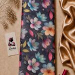 Vibrant multicolor floral pattern in pink, turquoise, blue, and peach tones on a deep navy background - Silk Jacquard (JD02)