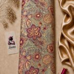 Silk jacquard with an elegant woven floral and butterfly pattern in burgundy and gold tones on a sage green base - Silk Jacquard (JD02)