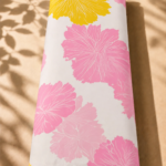 Modern oversized floral design featuring soft pink blooms with a bold yellow accent on a clean white background - SWISS COTTON (PC01)