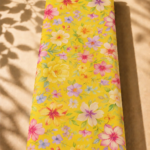 Delicate watercolor floral design with soft pink, lavender, and cream blossoms on a vibrant yellow background - SWISS COTTON (PC01)
