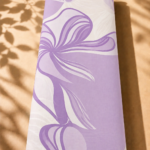 Soft lavender abstract floral design with flowing petals on an ivory background - Spanish Cotton (PC11)