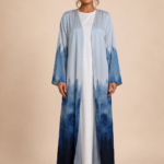 Elegant open abaya with a soft sky-blue to deep navy watercolor gradient and artistic brushstroke effect