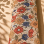 Soft ivory chiffon adorned with vintage florals in coral, navy, peach, and muted green tones - Italian Chiffon (CF01)