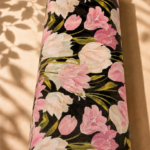 Black chiffon adorned with elegant blush pink and ivory tulip florals accented by olive-green stems - Italian Chiffon (CF01)