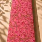 Vibrant pink chiffon adorned with elegant golden chain motifs over subtle tonal floral details - Italian Chiffon (CF01)