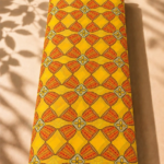 Bright yellow chiffon with repeating orange geometric motifs and delicate floral accents - Italian Chiffon (CF01)