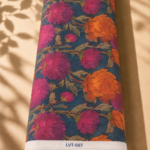 Deep teal chiffon adorned with bold fuchsia and vibrant orange florals accented by elegant muted leafy branches - Italian Chiffon (CF01)