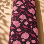 Deep burgundy chiffon adorned with soft pink florals and elegant fuchsia leafy vines - Italian Chiffon (CF01)