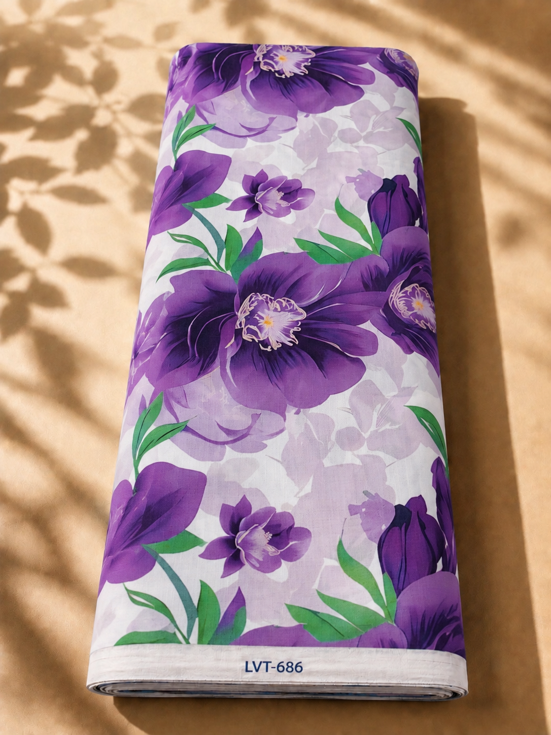 2026/08/1000058895.png Soft white cotton with large purple florals and fresh green leaves over delicate lavender floral shadows - Italian Cotton (PC02) - الصورة 1