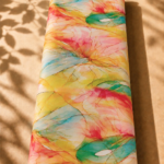 Vibrant multicolor cotton with flowing abstract watercolor forms in yellow, coral, turquoise, and green - Italian Cotton (PC02)