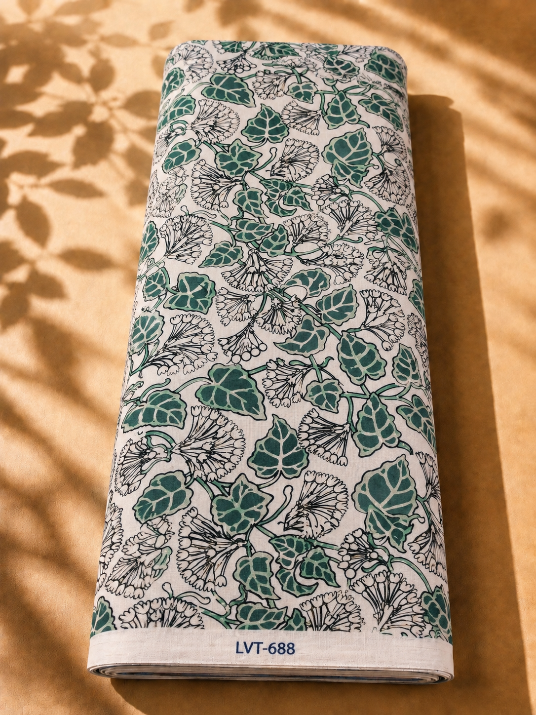 2026/08/1000058904.png Ivory cotton with elegant deep green leaves and delicate black botanical florals - Italian Cotton (PC02) - الصورة 1