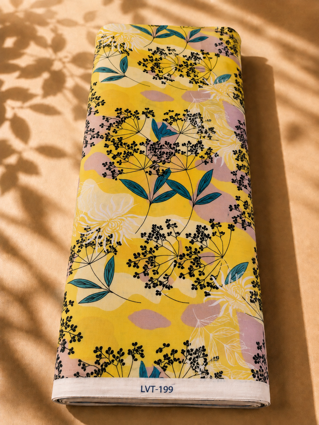 2026/08/1000058905.png Bright yellow cotton with delicate black botanical florals, teal leaves, and soft blush accents - Italian Cotton (PC02) - Image 1