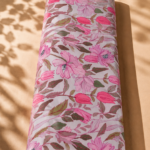 Soft white cotton with delicate pink floral blooms and buds, accented by muted olive-green leaves - Italian Cotton (PC02)